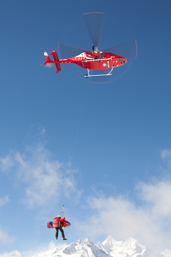 mountains
 Mountain Rescue
 helicopter
 rescue
 rescue helicopter
 Switzerland
 injured
