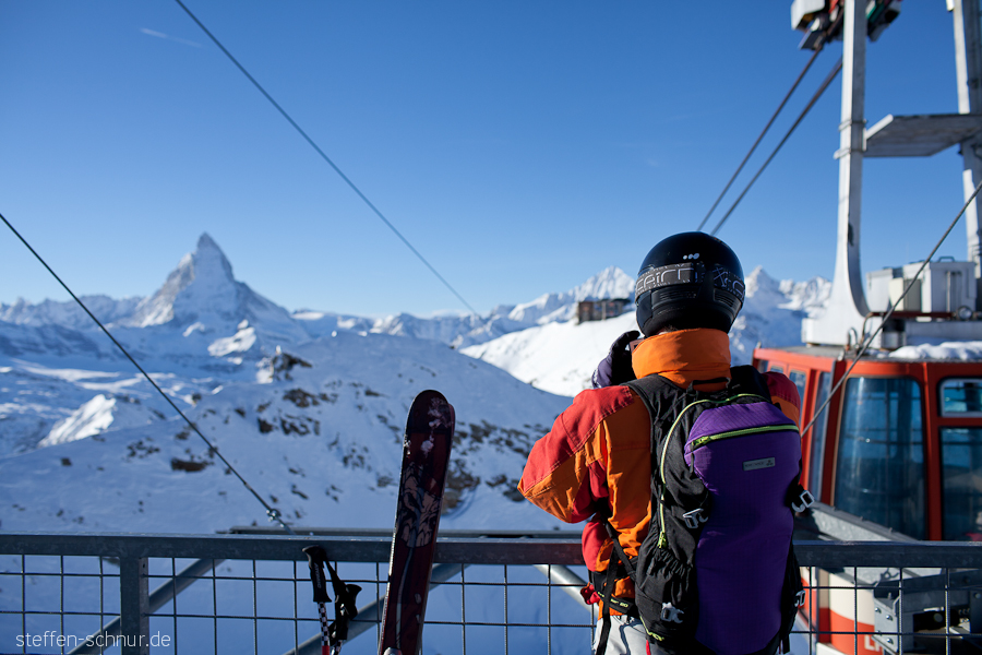 alps
 helmet
 Switzerland
 skiers
 winter

