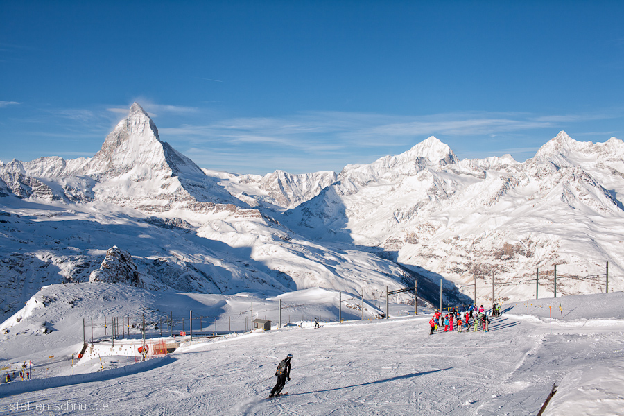 snow
 alps
 approach
 children
 group of children
 children ski
 Matterhorn
