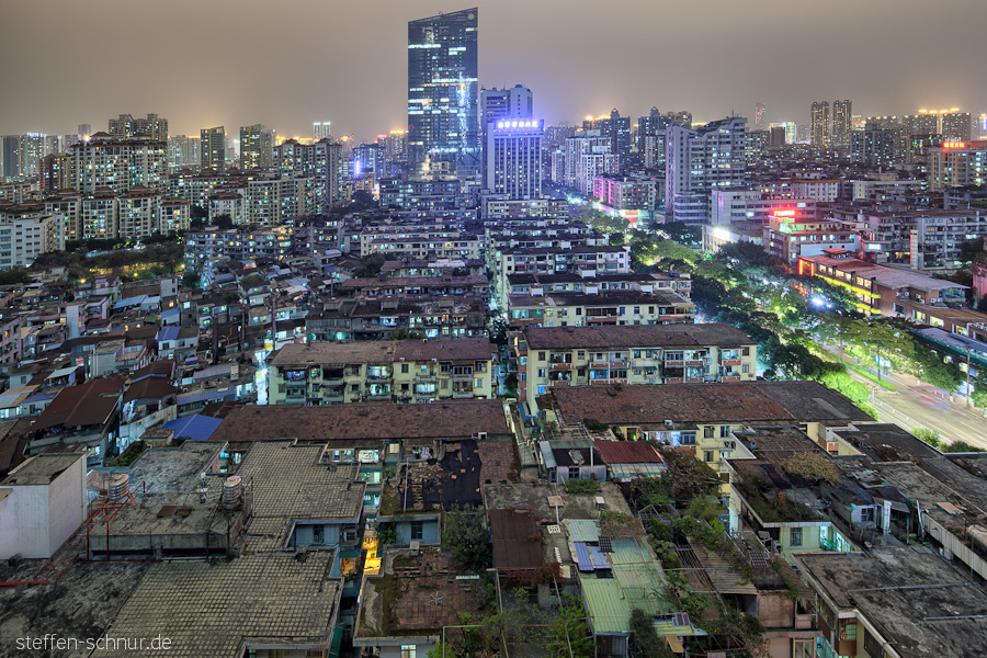 Guangzhou
 China
 roofs
 high rise
 houses
 sea of houses
 mega city
