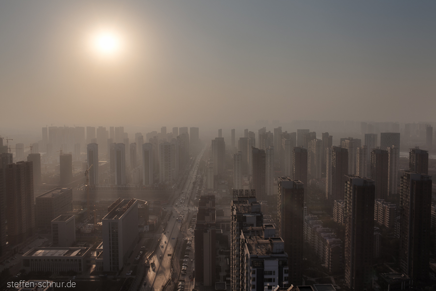 city skyline
 cars
 smog
 sunset
 pollution
 Shenyang
 China
