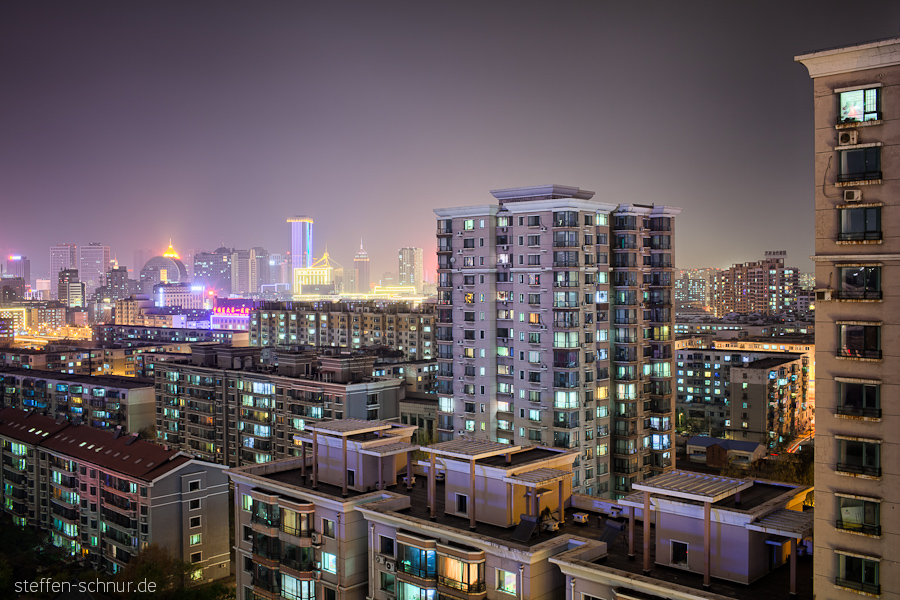 housing
 Shenyang
 China
 roofs
 window
 high rise
 night

