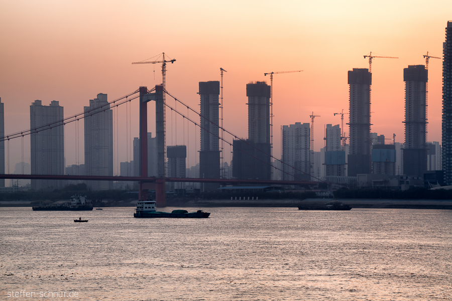 sunset
 ship
 Wuhan
 China
 construction sites
 Bridge
 river
