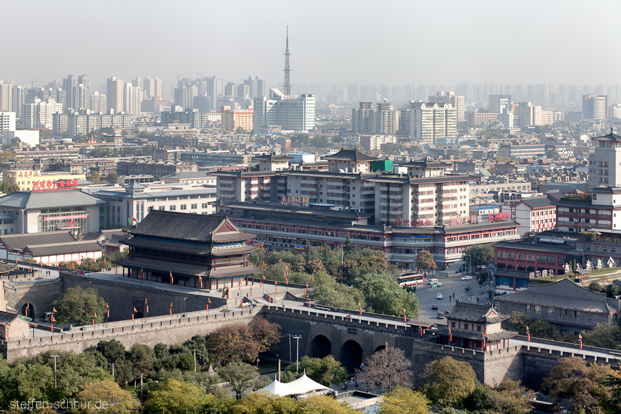 tourism
 city skyline
 city wall
 city gate
 old and new
 Xian
 China
