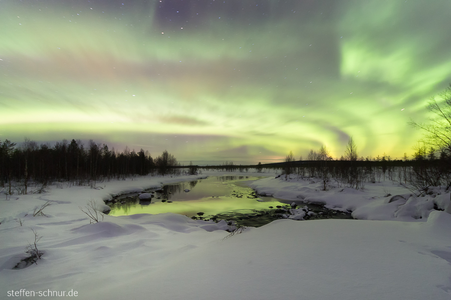 aurora borealis
 snow
 Polar Circle
 Lapland
 Finland
 river
 reflection
