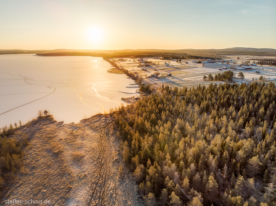 ice
 sunrise
 Lapland
 Finland
 village
 aerial photograph
 forest
