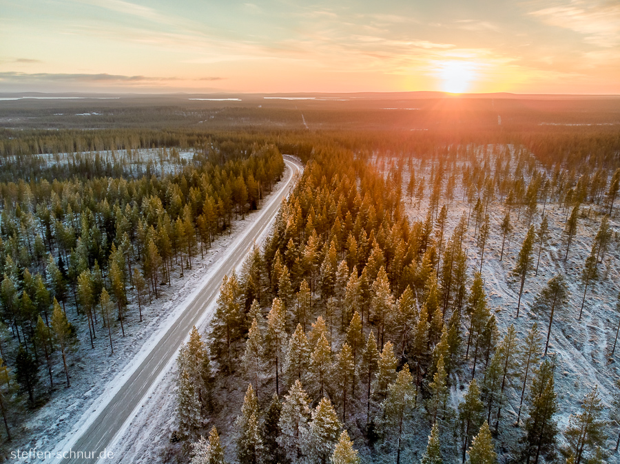 sunset
 Lapland
 Finland
 horizon
 street
 forest
 winter
