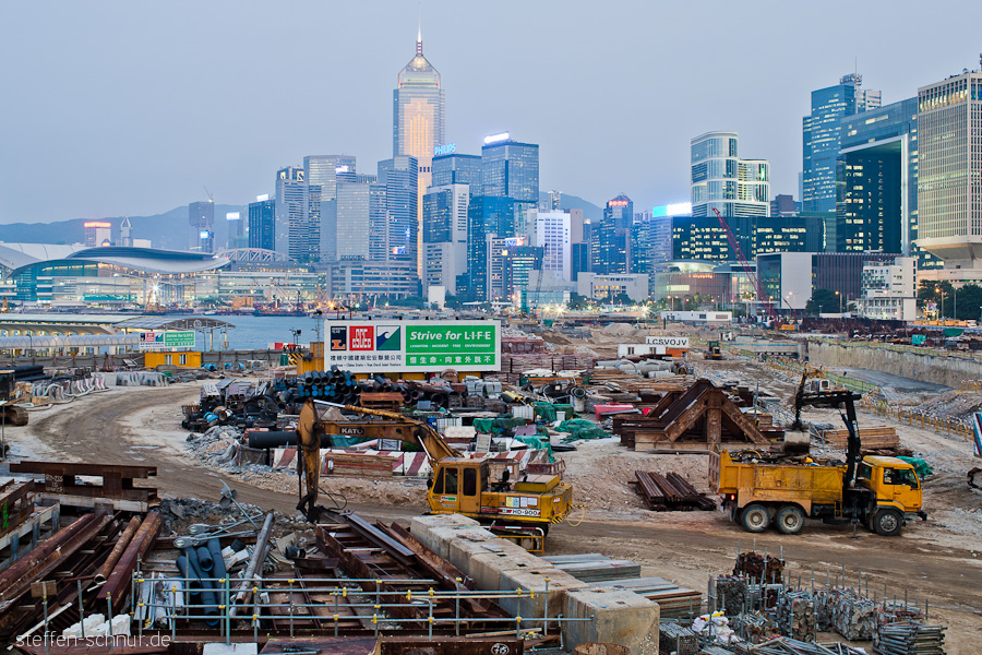 city skyline
 Hong Kong Island
 Hong Kong
 China
 excavator
 building lot
