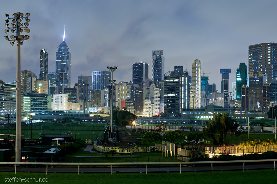 racetrack
 horse race
 city skyline
 Happy Valley
 Wan Chai
 Hong Kong
 China
