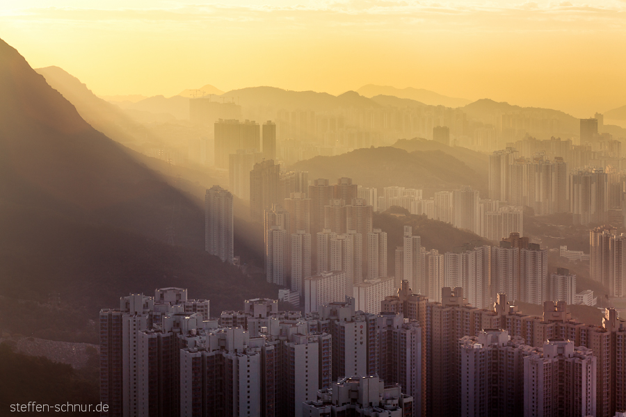 mountain
 survey
 Hong Kong
 China
 skyscrapers
 sea of houses
 fog
