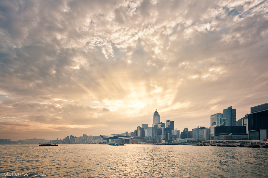 city skyline
 ship
 sunrise
 Hong Kong
 China
 skyscrapers
 sunlight
