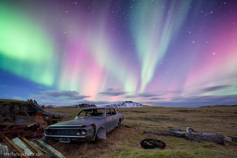 Iceland
 car
 Northern lights
