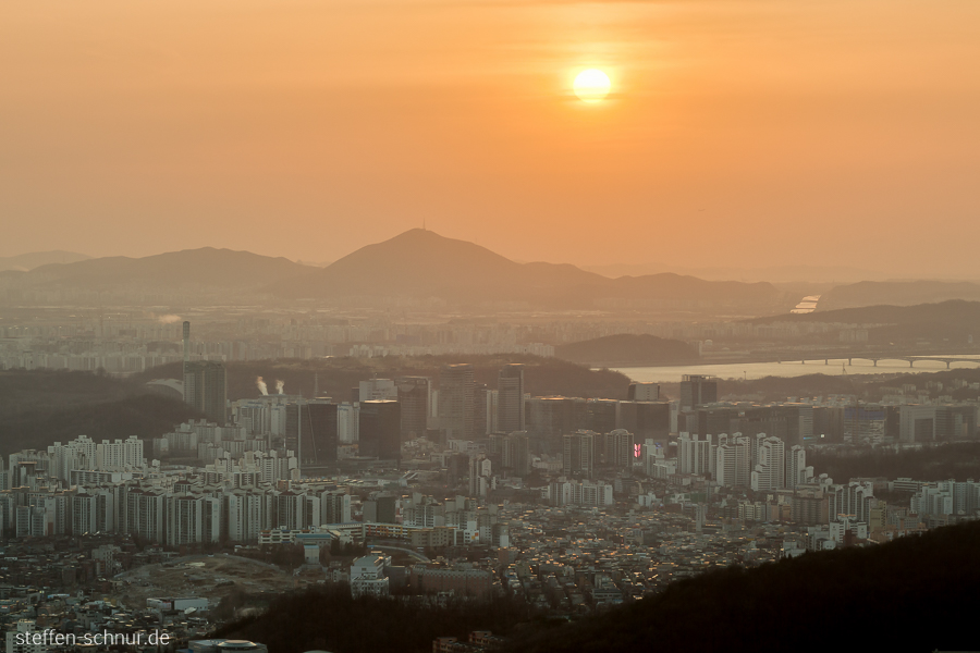mountains
 Seoul
 South Korea
 metropolis
 sun
