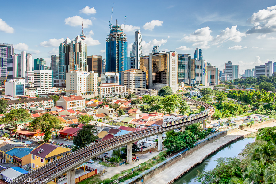 city skyline
 railroad track
 Kuala Lumpur
 Malaysia
 train
