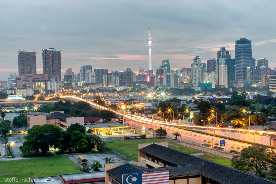 city skyline
 Kuala Lumpur
 Malaysia
 country flag
 street
 gas station
