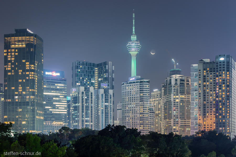 televisiontower
 city skyline
 moon
 Kuala Lumpur
 Malaysia
 Trees
 night
