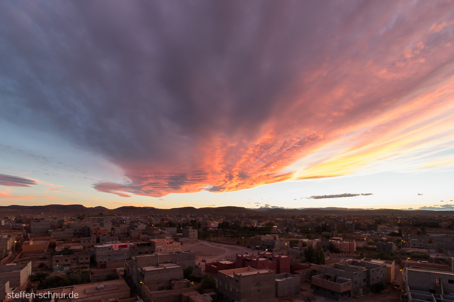 sunset
 Tabounte
 Morocco
 city
 clouds
