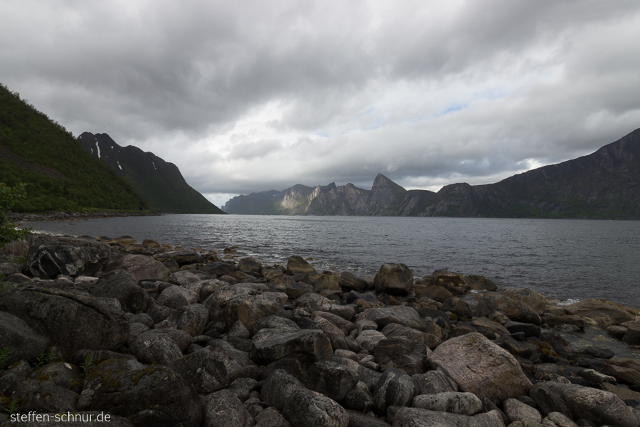 mountain
 Senja
 fjord
 coast
 Norway
 stones
 clouds

