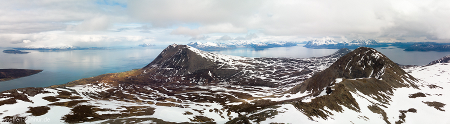 mountains
 field work
 fjord
 Norway
 panorama view
 blanket of clouds
