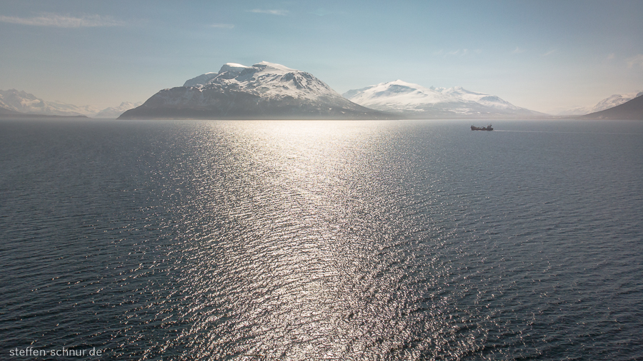 snow
 mountains
 ship
 Polar Circle
 sea
 Norway
