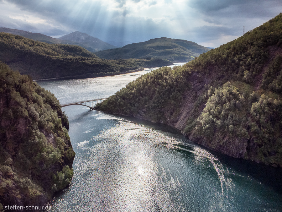 Bridge
 fjord
 Norway
 sunlight
