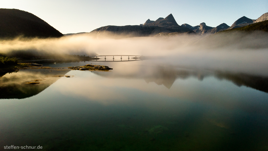 Bridge
 fjord
 fog
 Norway
 mirroring
