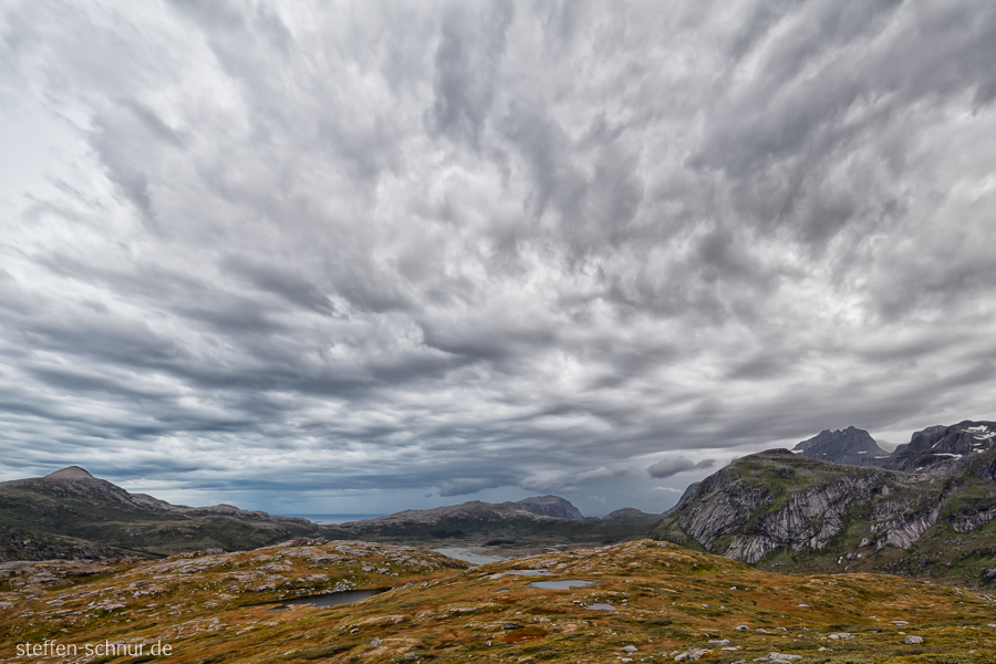 Flakstadøy
 summit
 landscape
 Lofoten
 nature
 Norway
 rainy weather
