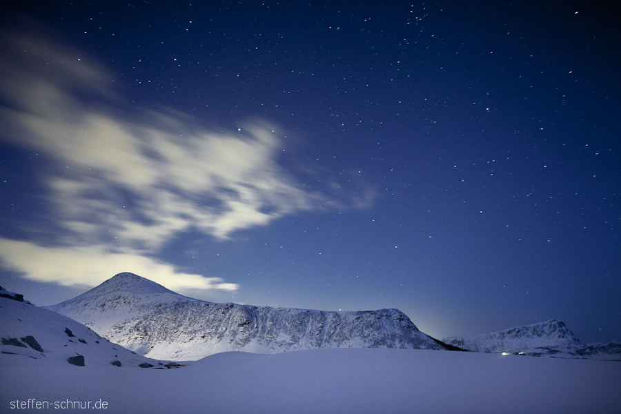 snow
 mountain
 Lofoten
 Norway
 stars
 clouds
