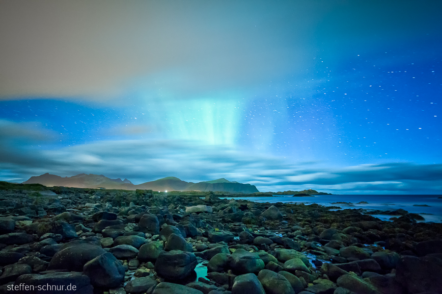aurora borealis
 mountains
 North Sea
 Nordland
 beach
 starry sky
 stars
