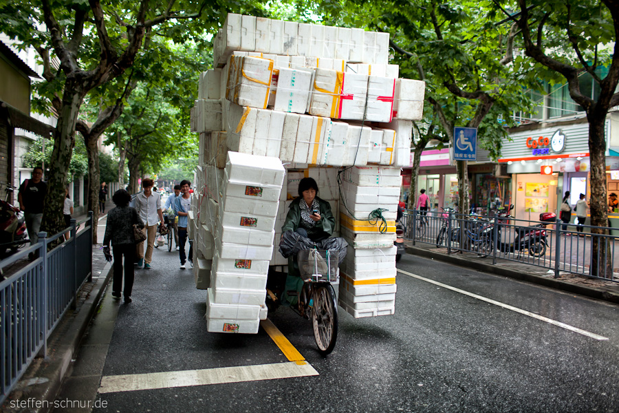 bike
 Shanghai
 China
 mobile
 traffic rules
 overcharge
