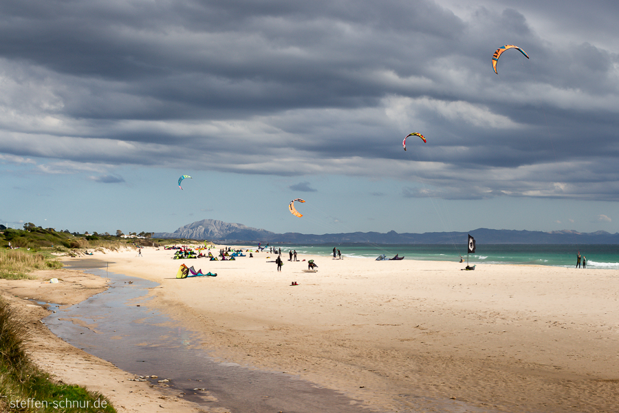 kites
 Spain
 Andalusia
 beach
 clouds

