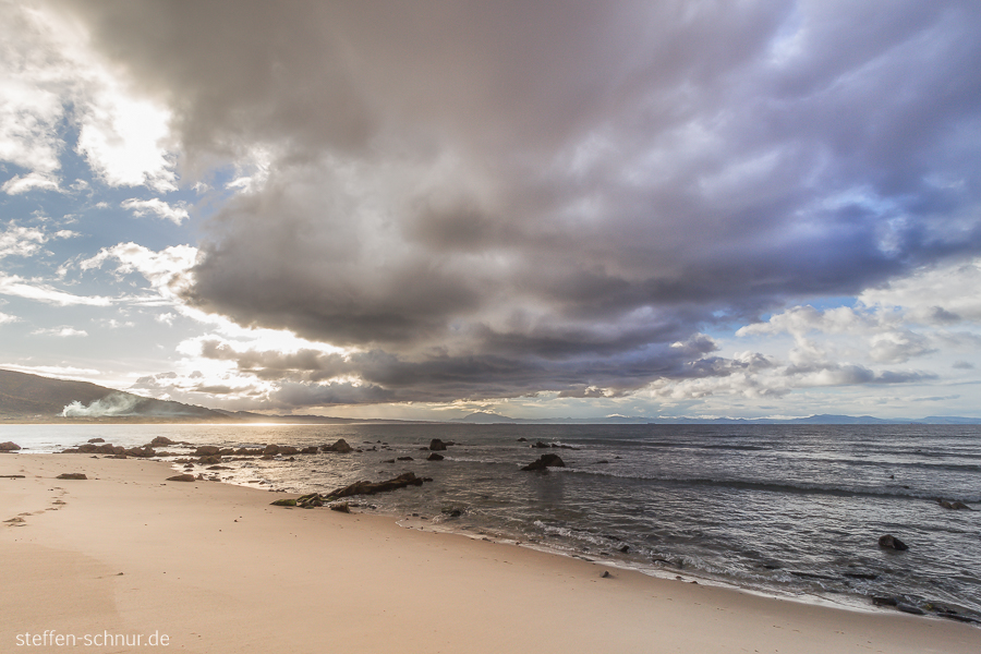 Spain
 Andalusia
 coast
 beach
 dark clouds
