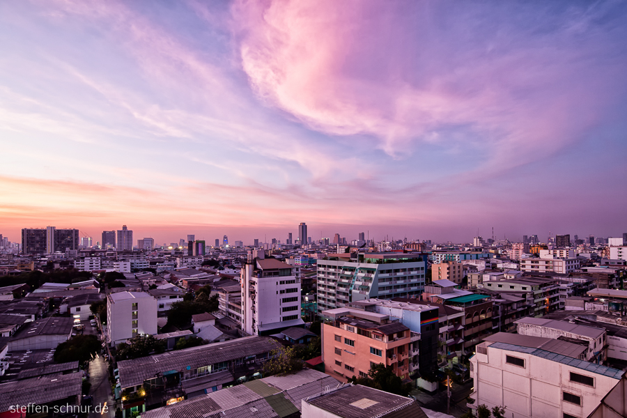 city skyline
 sunset
 Bangkok
 Thailand
 roofs
 clouds
