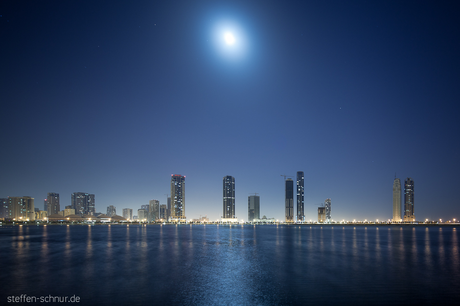 moon
 Sharjah
 skyscrapers
 mosque
 stars
 UAE
 Water
