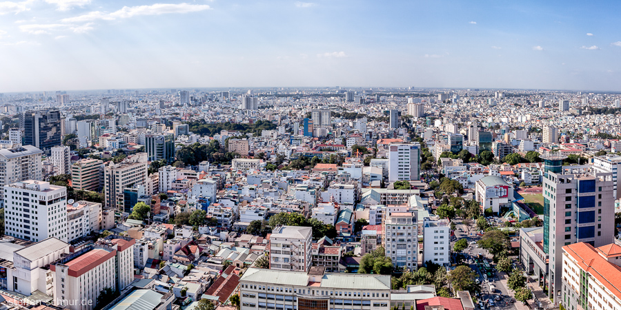 Ho Chi Minh City
 Saigon
 Vietnam
 sea of houses
 panorama view
 sunlight
