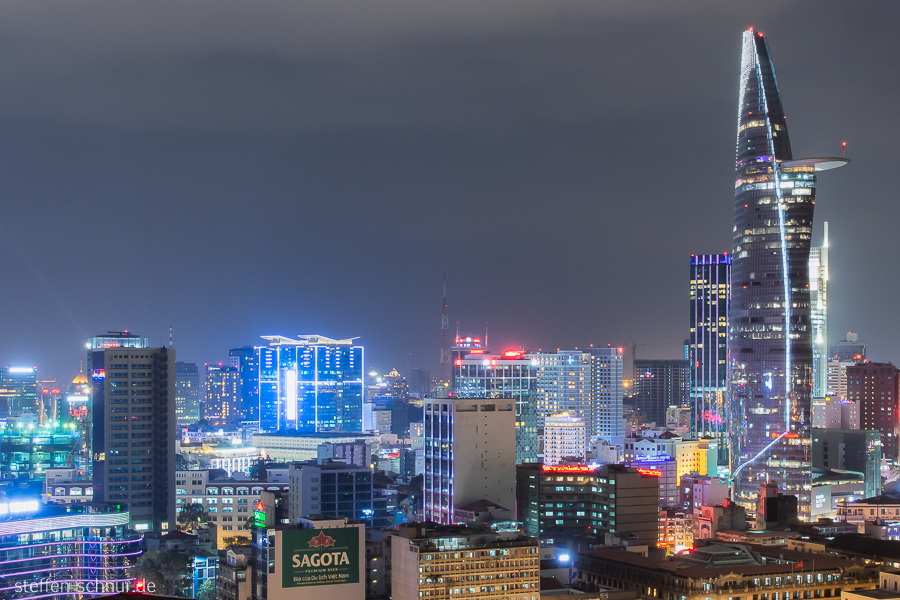 Bitexco Financial Tower
 city skyline
 Ho Chi Minh City
 Saigon
 Vietnam
 night
