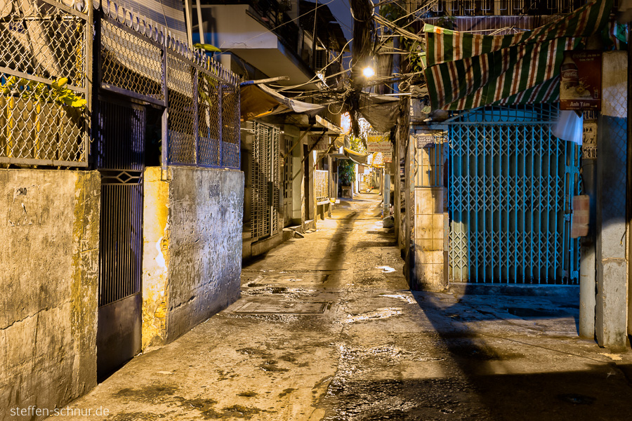Saigon
 Vietnam
 alley
 night
 door
